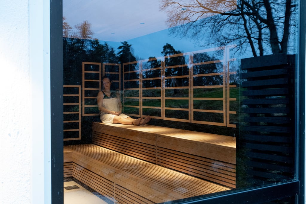 Woman enjoying the sauna at Skepparholmen Nacka