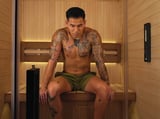 A person sitting inside of a Halmstad sauna