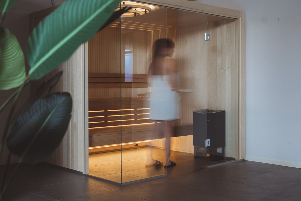 Woman in a Harmony sauna room