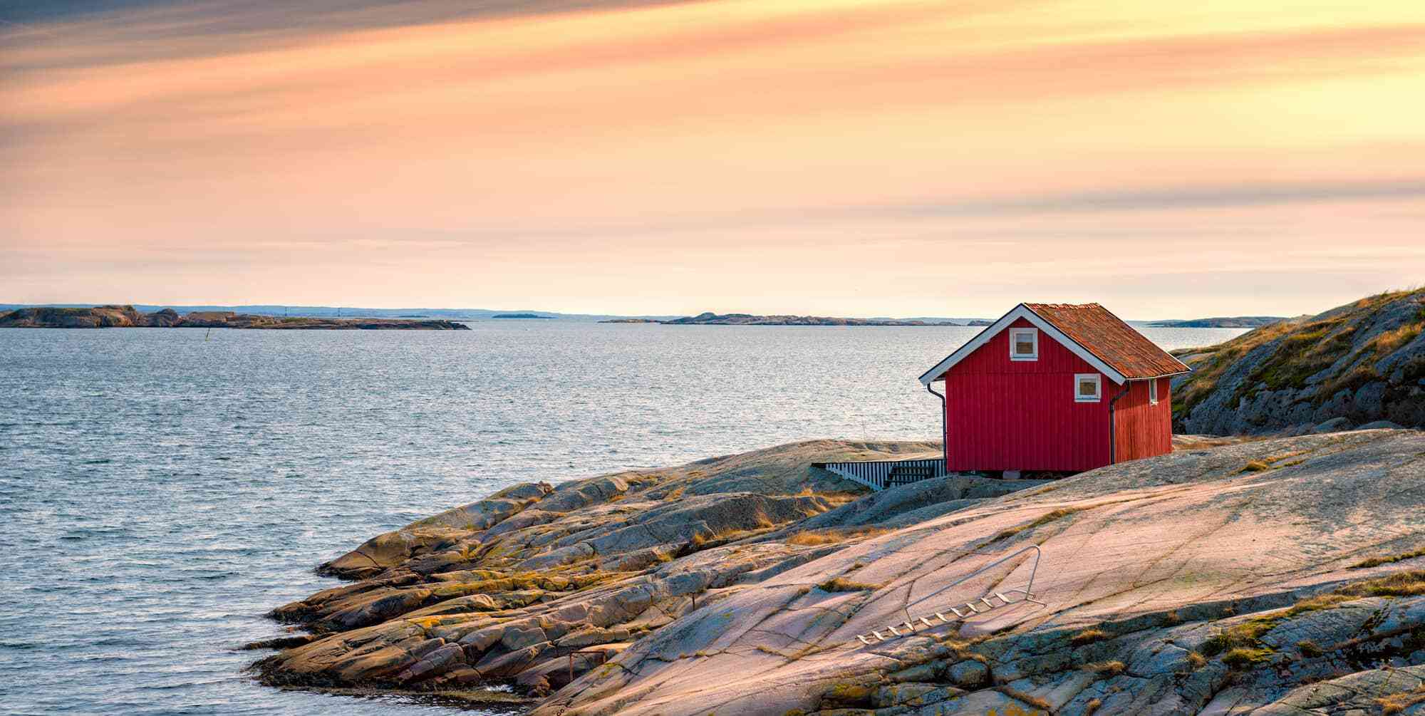 red cabin by the sea