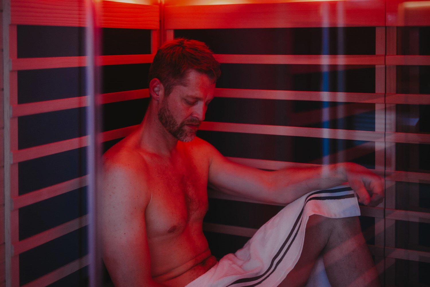 man in IR sauna